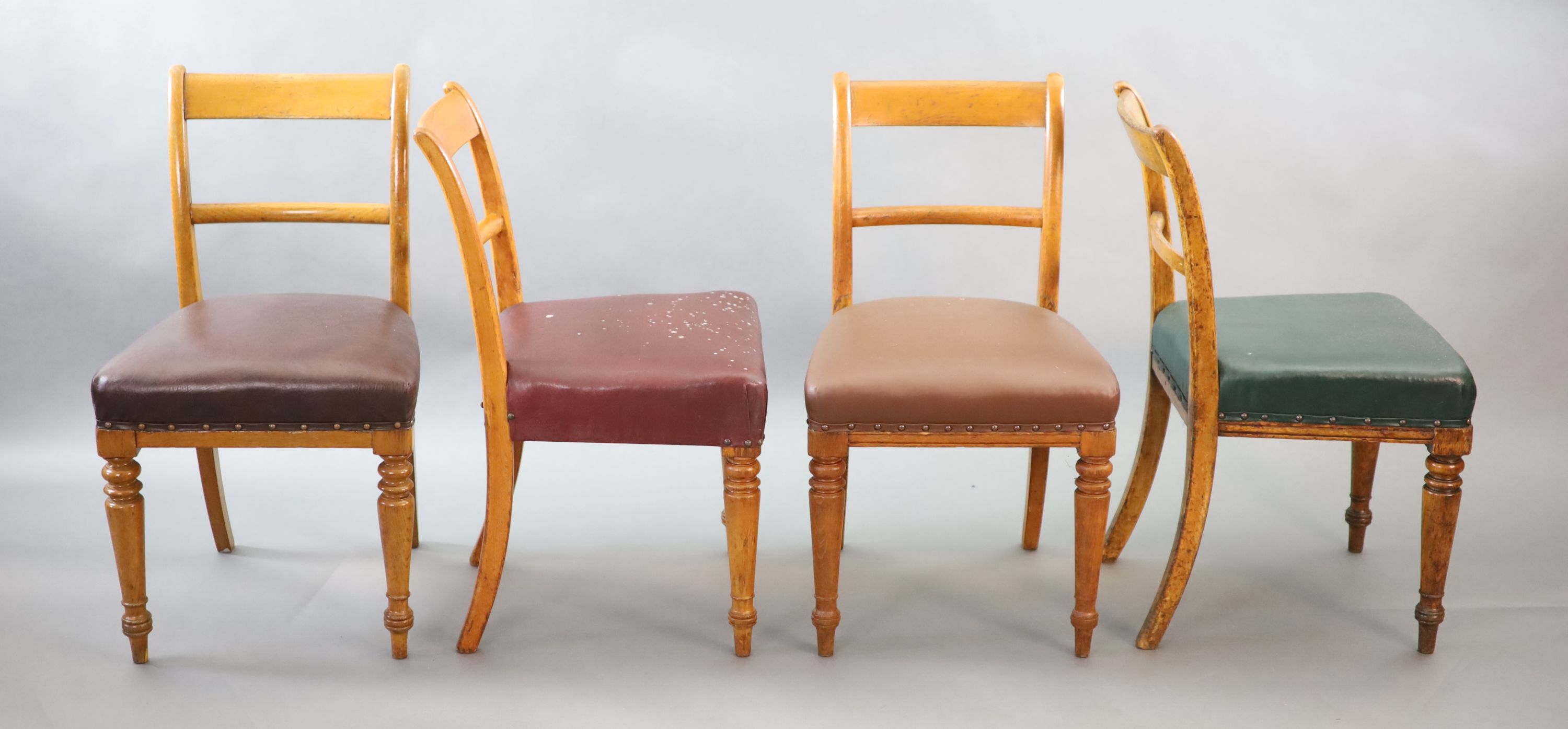 A set of eight early Victorian oak dining chairs